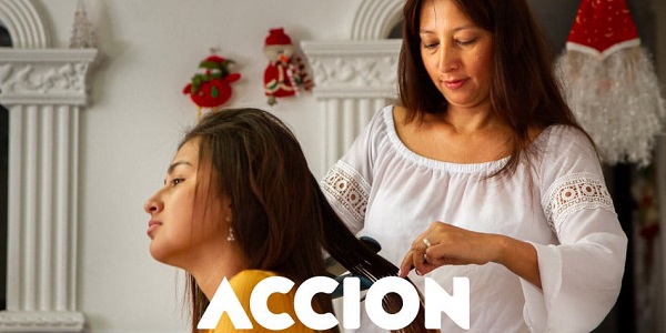 woman brushing daughter's hair
