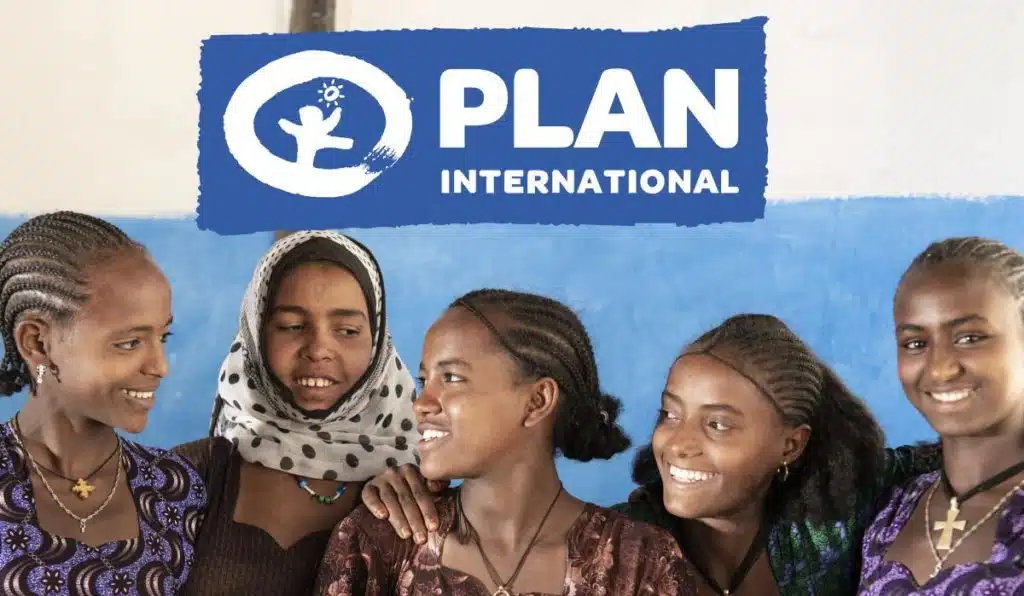 Plan International logo above five girls