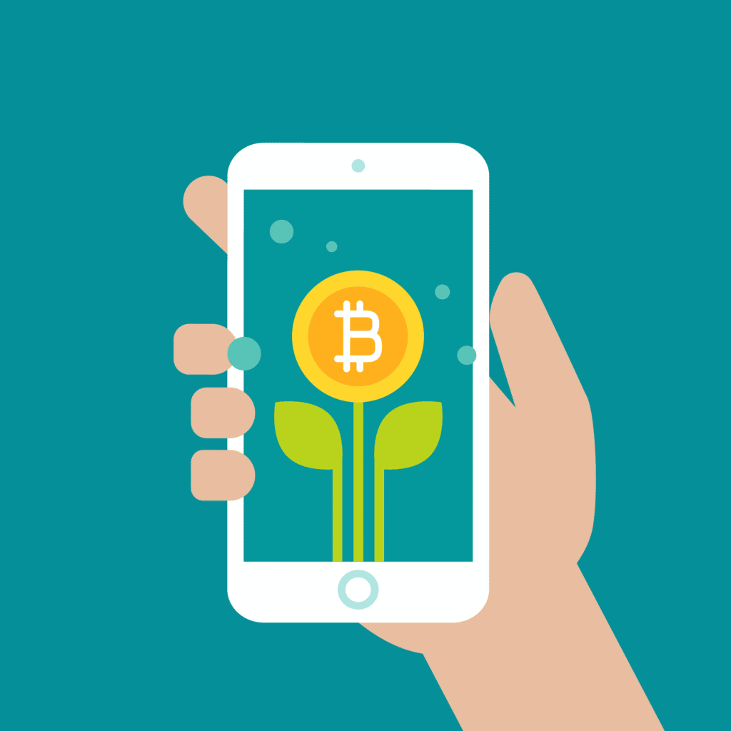 Hand holding a phone with bitcoin on the screen
