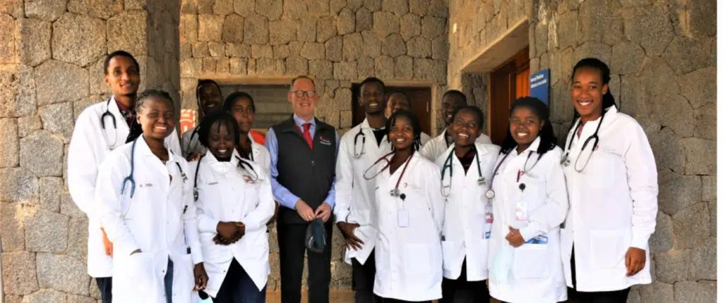 Dr. Paul Farmer with UGHE students