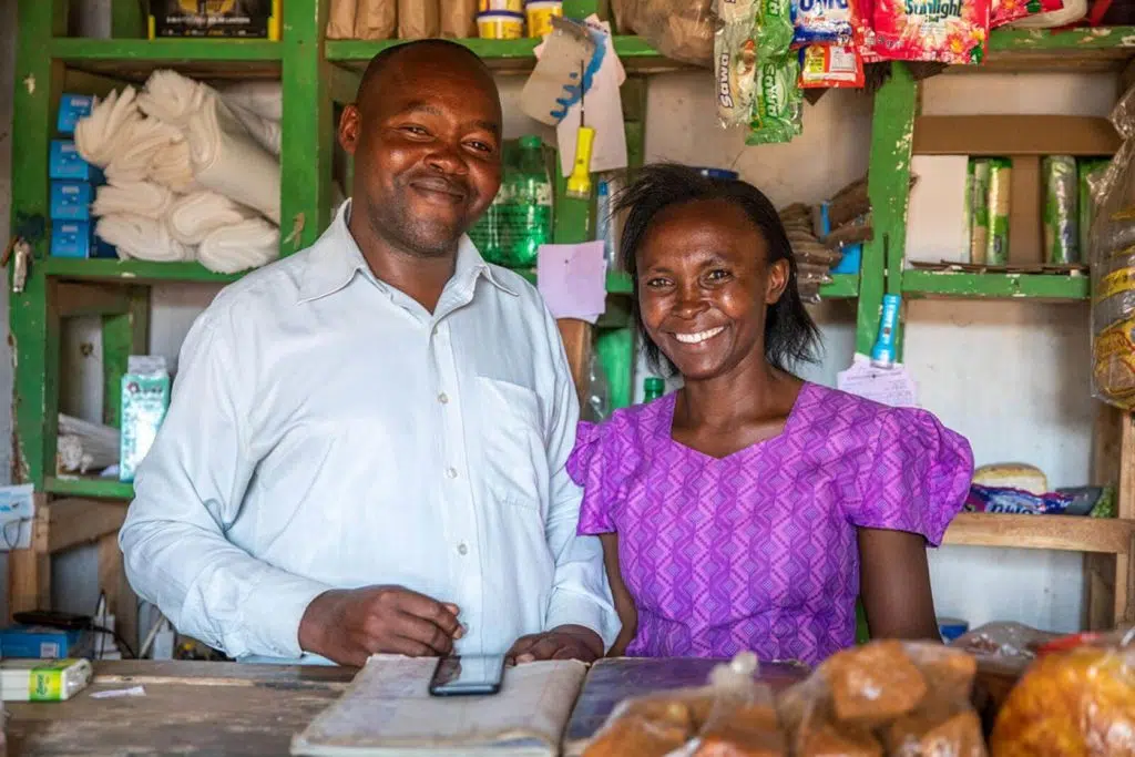 Lydia Ndimu Mutua and her husband, at their small shop.