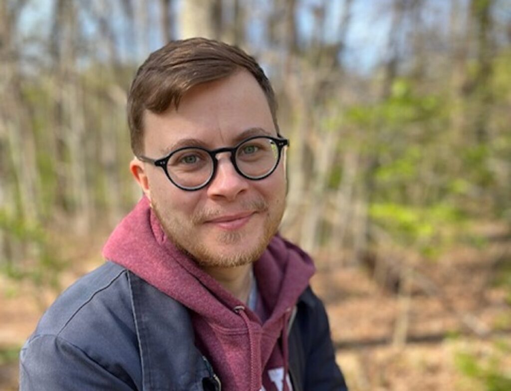 Man smiling outside