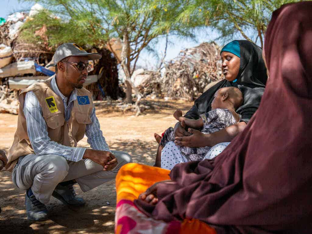 IRC Nutrition Officer Dr. Ahmed speaks with 21-year-old mother Nasteho in her home at Gadoon Village.