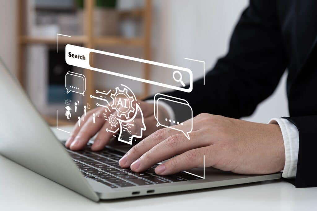 Businessman using AI on a laptop
