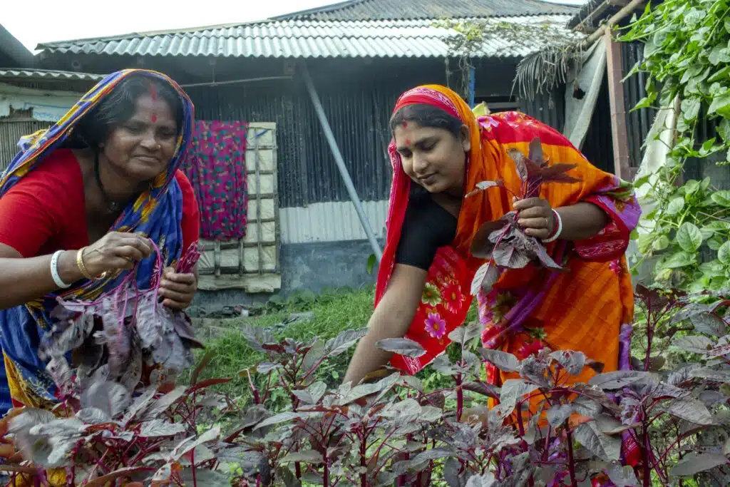 Sharmila and her mother-in-law in their garden.