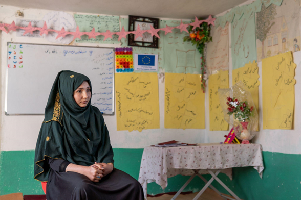 Photo of Hajera, a 19-year-old Community-Based Education (CBE) teacher working with the IRC