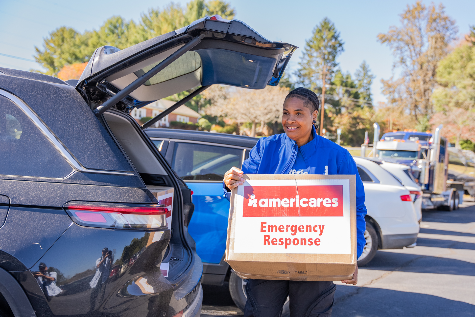 Shonda Scott, Manager of U.S. Emergency Response distributes boxes of hygiene kits. They’ll be distributed to individuals in need throughout Buncombe County, North Carolina, including individuals living in tents, who have been displaced due to Hurricane Helene. Tuesday, Oct. 22, 2024 (Photo/Mike Demas)