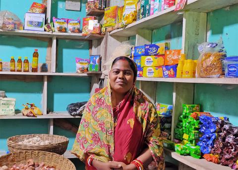 Rosina posing in her grocery store