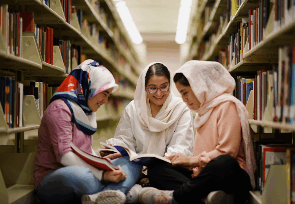 Arifa, Zahra & Hadisa studying in the ASU library