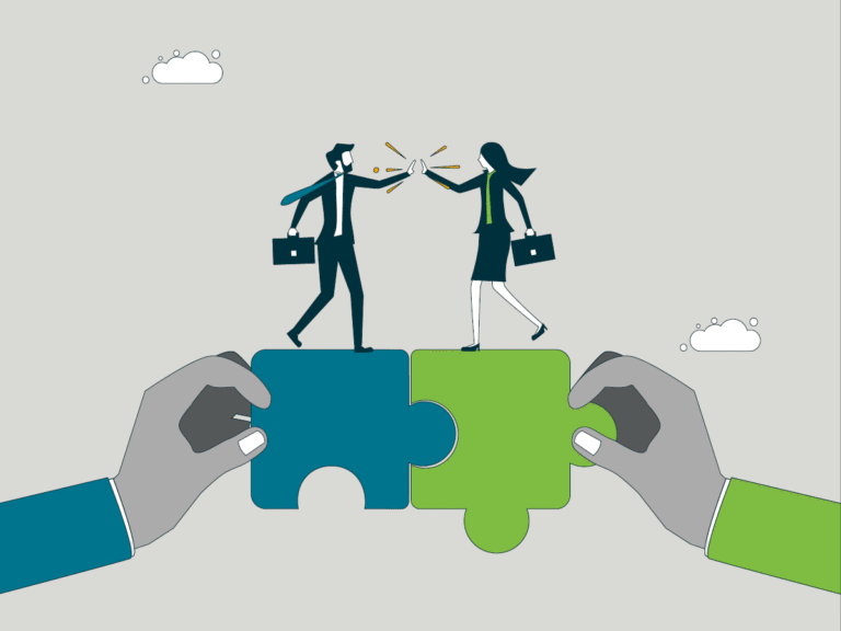 Two hands holding puzzle pieces with corporate man and woman high fiving