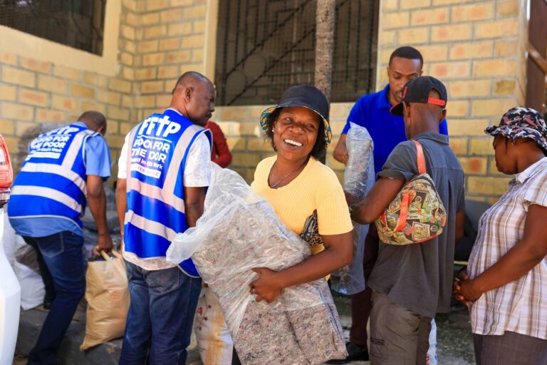In this April 2024 file photo, FFTP-Haiti provided 20 cases of MannaPack rice and soy protein meals from partner Feed My Starving Children, 24 bags of Taiwanese rice, six cases of red kidney beans, and 20 cases of mackerel to displaced families through Réseau National de Défense des Droits de l'Homme.